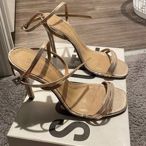 Altina Metallic Embossed Leather Sandals
- SCHUTZ